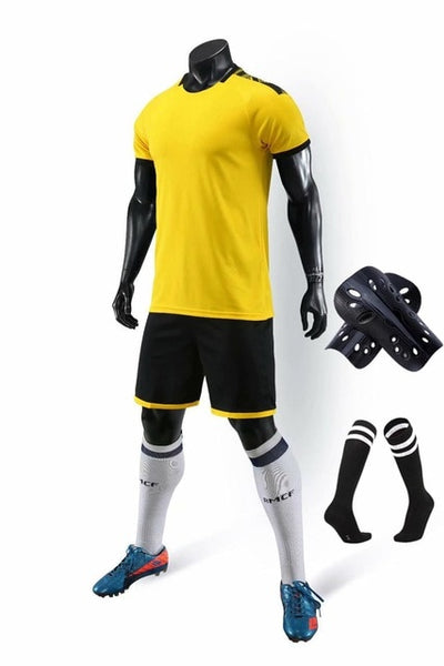 Men running Training Uniforms set with socks and shin guard