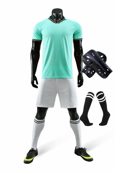 Men running Training Uniforms set with socks and shin guard